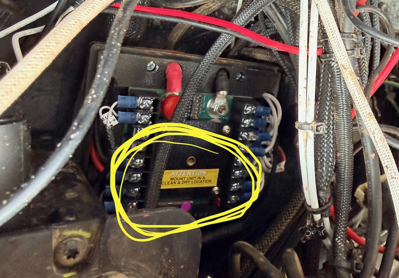 Water-damaged electrical component mounted inside car 355