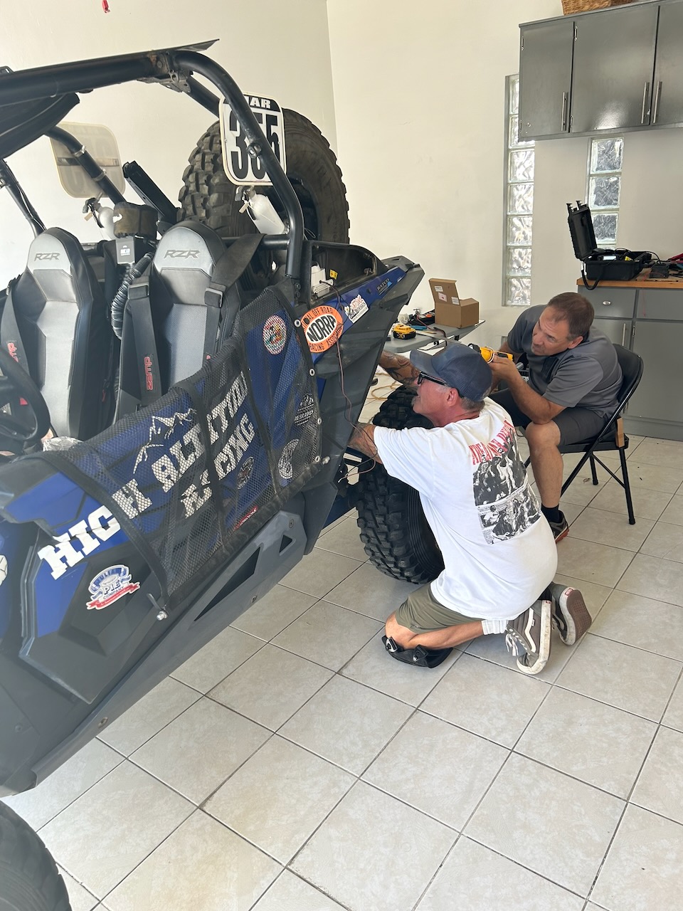Chris and Lance shoehorning the CVT blower into position