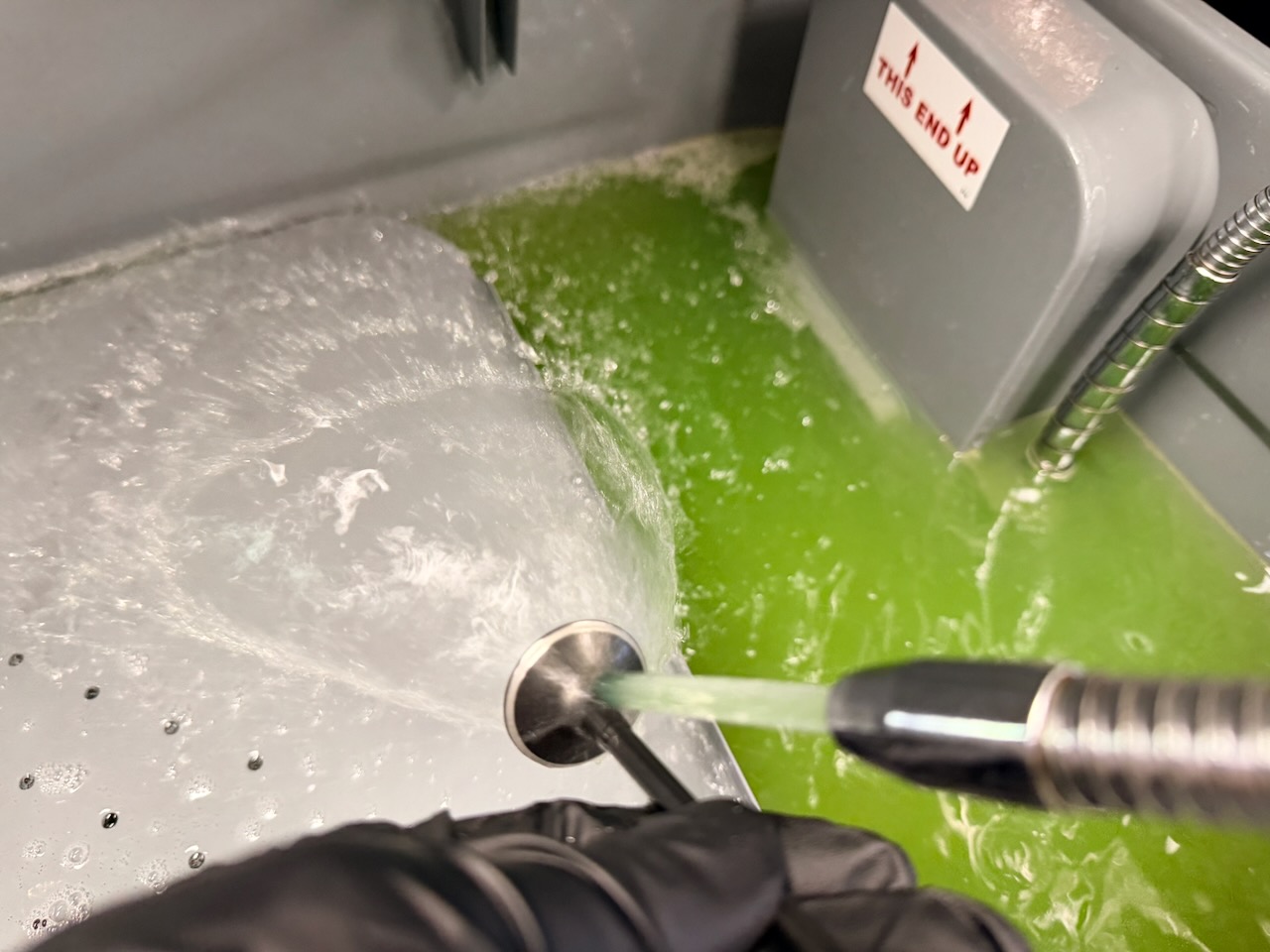 Cleaning an engine valve by hand