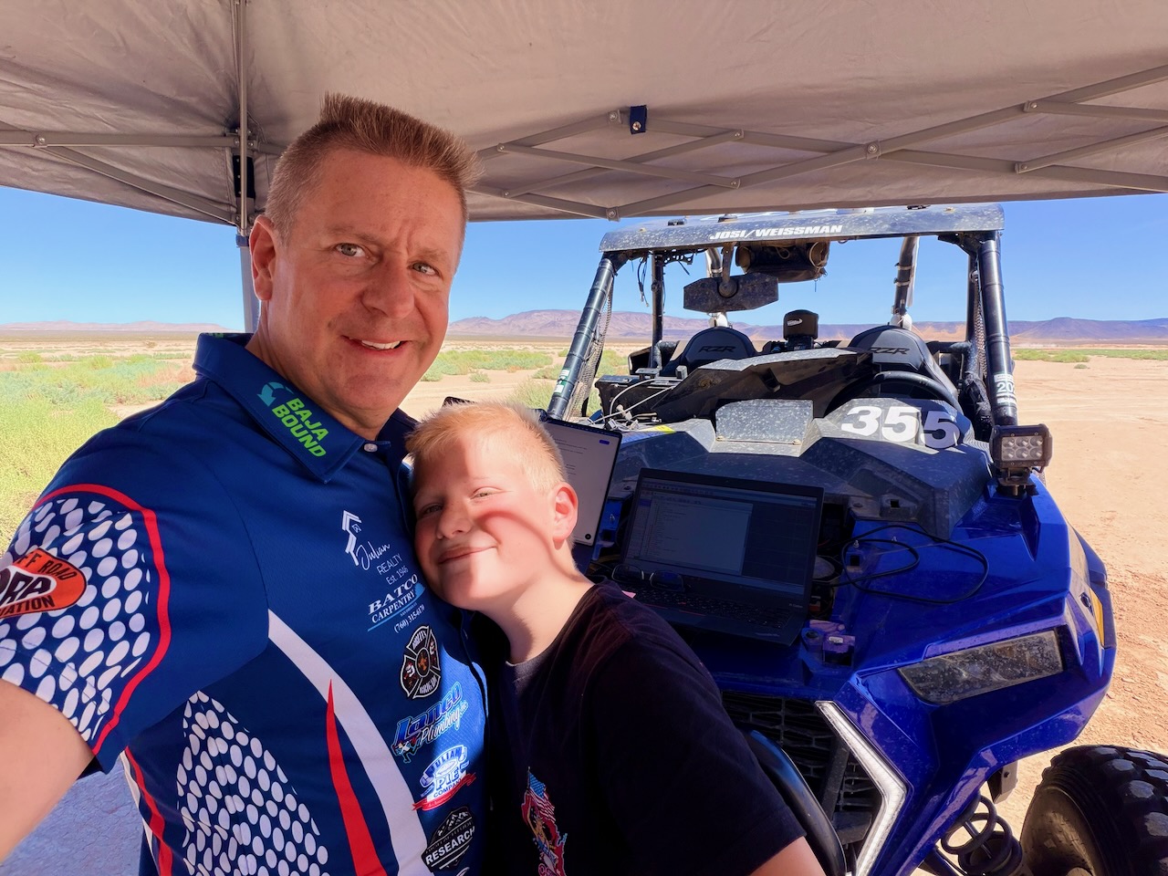 High Altitude Racing teaching a young racer about vehicle setup
