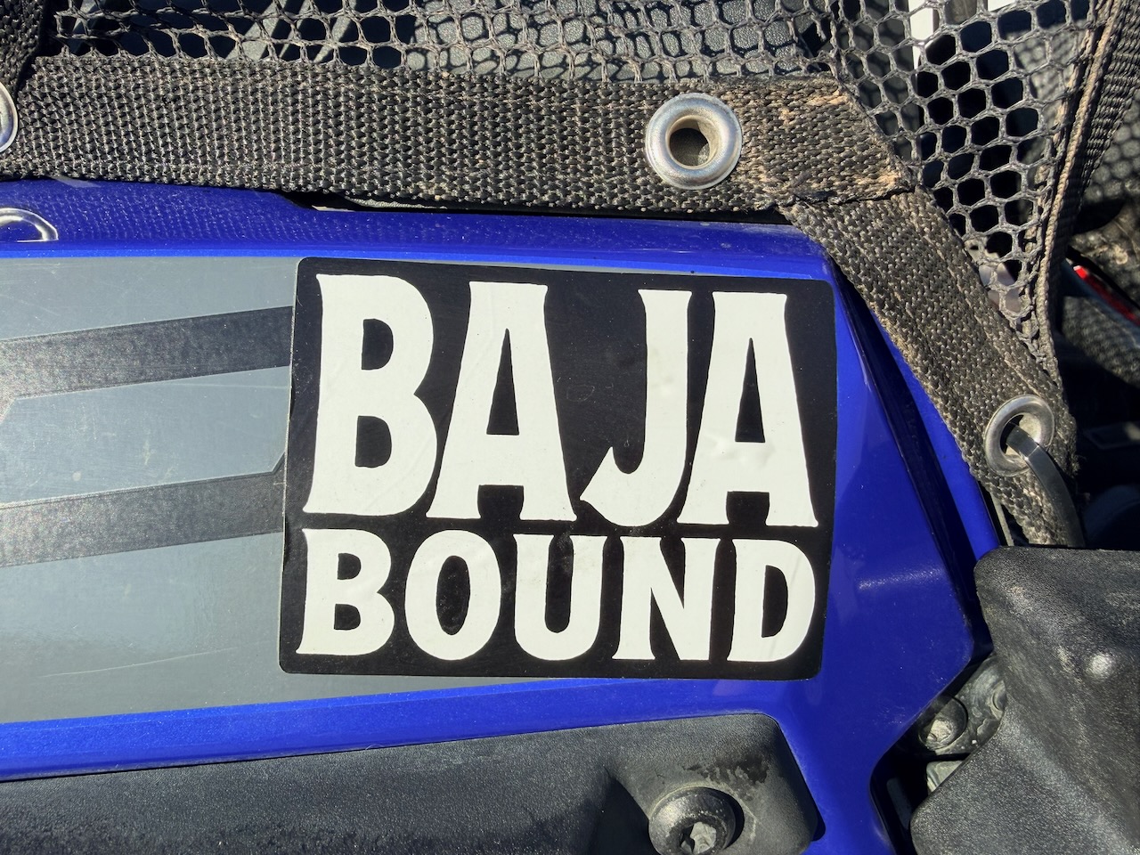 Baja Bound sponsor sticker on race car 355
